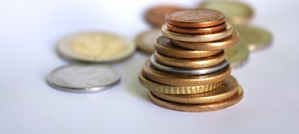 copper and silver coins in a pile