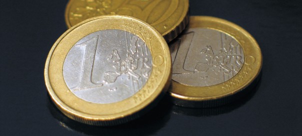 three euro coins two one euro and a 50 euro cent coin